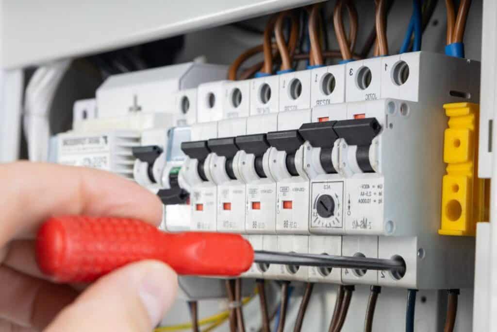 Electrician residential near me tightening RCD switch terminals in High Wycombe home