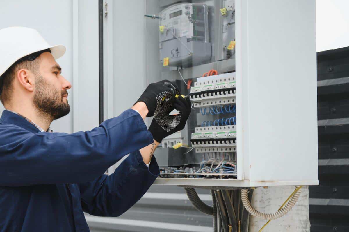 Residential Electrician Perth checking electrical box with meter and circuit switches