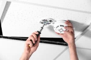How many smoke alarms are required in a house